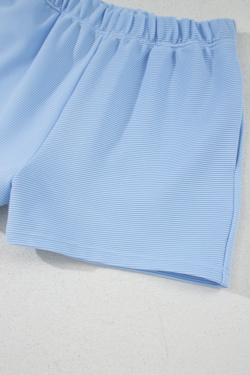 Beau Blue Ribbed Texture Half Zip Ruffled Short Sleeve Top