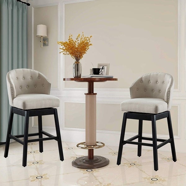 Copper Grove Arichuna Solid Wood Swiveling Tan Tufted Bar Stools (Set